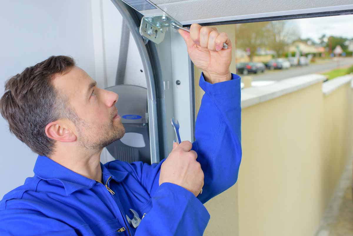 Garage door technician at work